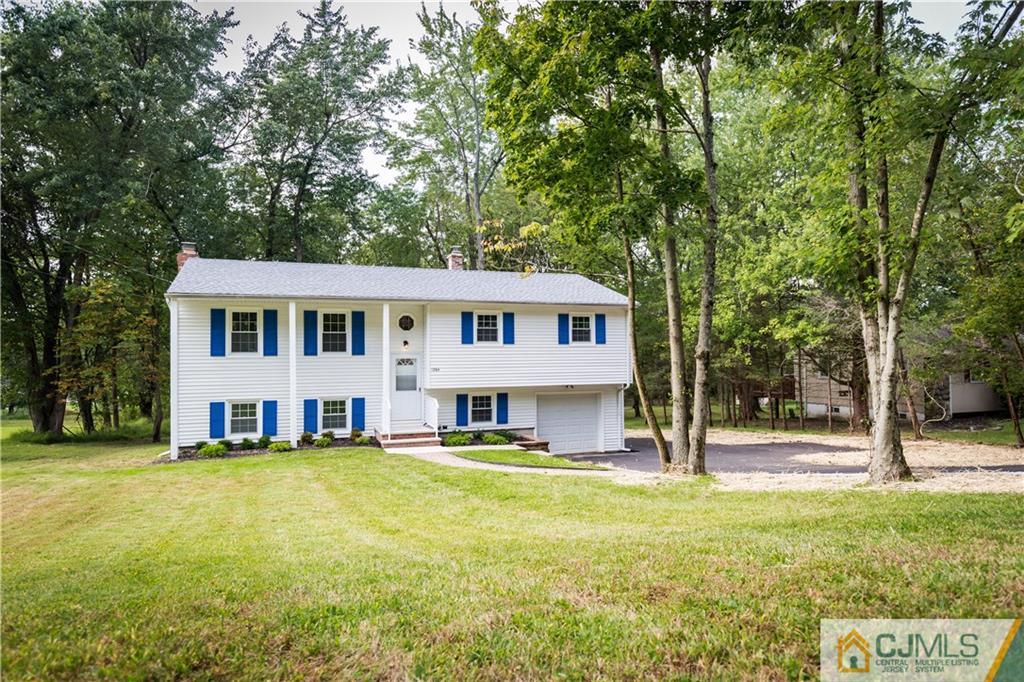 1264 Washington Valley Road Bridgewater, NJ 08807 - Photo 1 of 25 a view of a house with a swimming pool