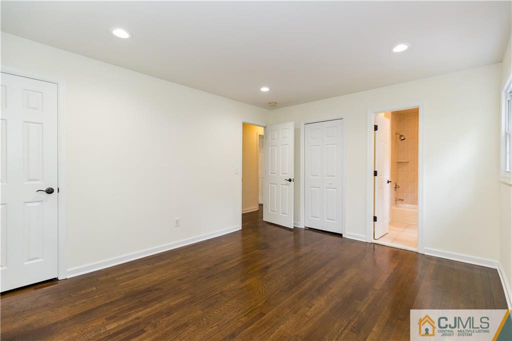 1264 Washington Valley Road Bridgewater, NJ 08807 - Photo 14 of 25 a view of an empty room with wooden floor
