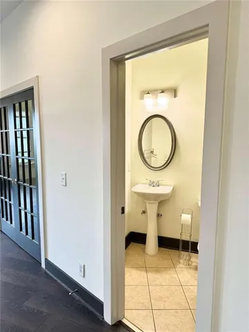 a bathroom with a sink and a mirror