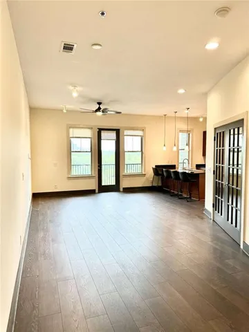 a view of livingroom with furniture and windows