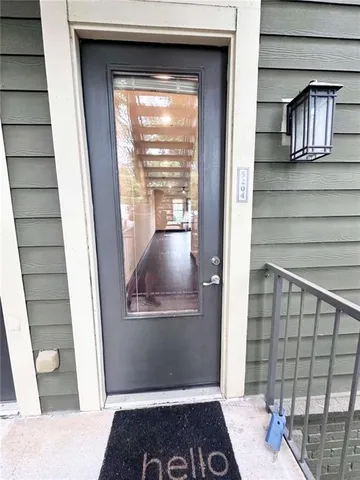 a view of livingroom and hardwood floor