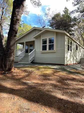 a view of a yard from a balcony