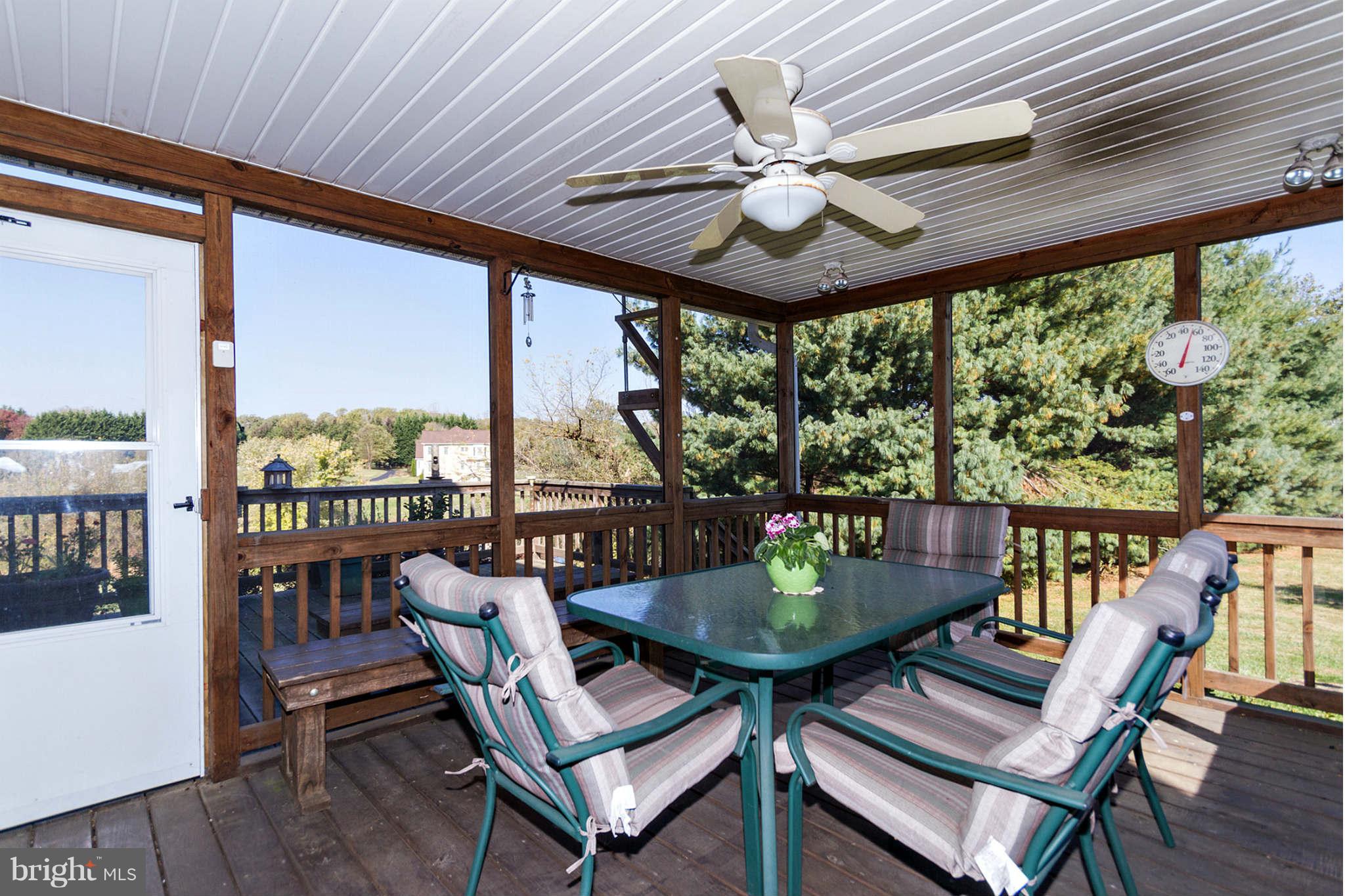 4531 Rutherford Way Dayton, MD 21036 - Photo 12 of 26 Rear Screened Porch With Ceiling Fan