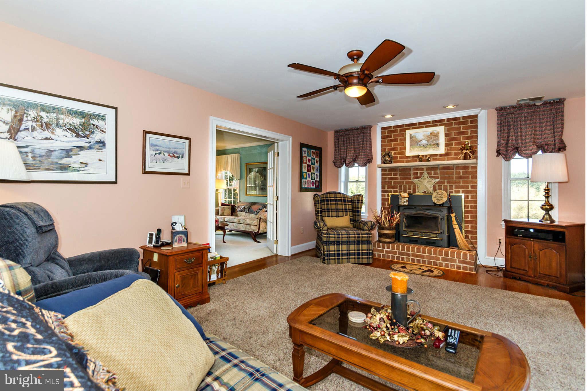 4531 Rutherford Way Dayton, MD 21036 - Photo 9 of 26 1st Floor Family Room w/ Fireplace