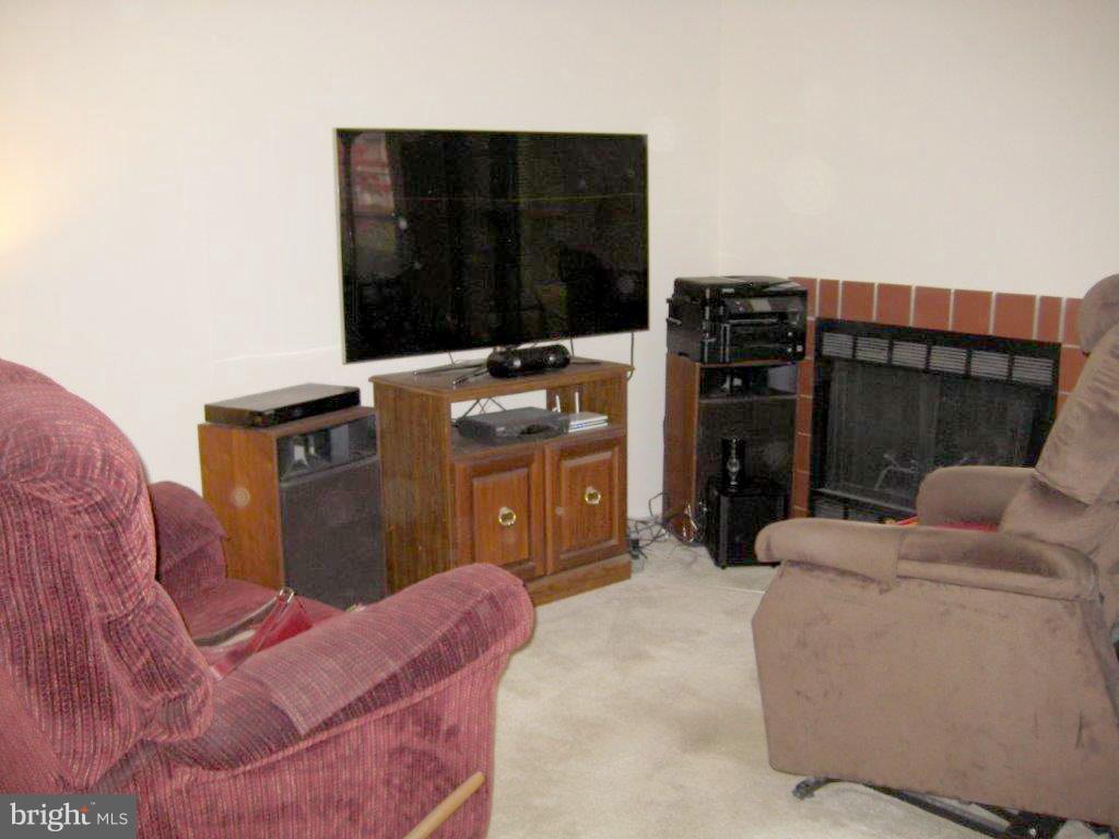 1730 Ascot Way, Unit A Reston, VA 20190 - Photo 9 of 18 Cozy fireplace in Living Room