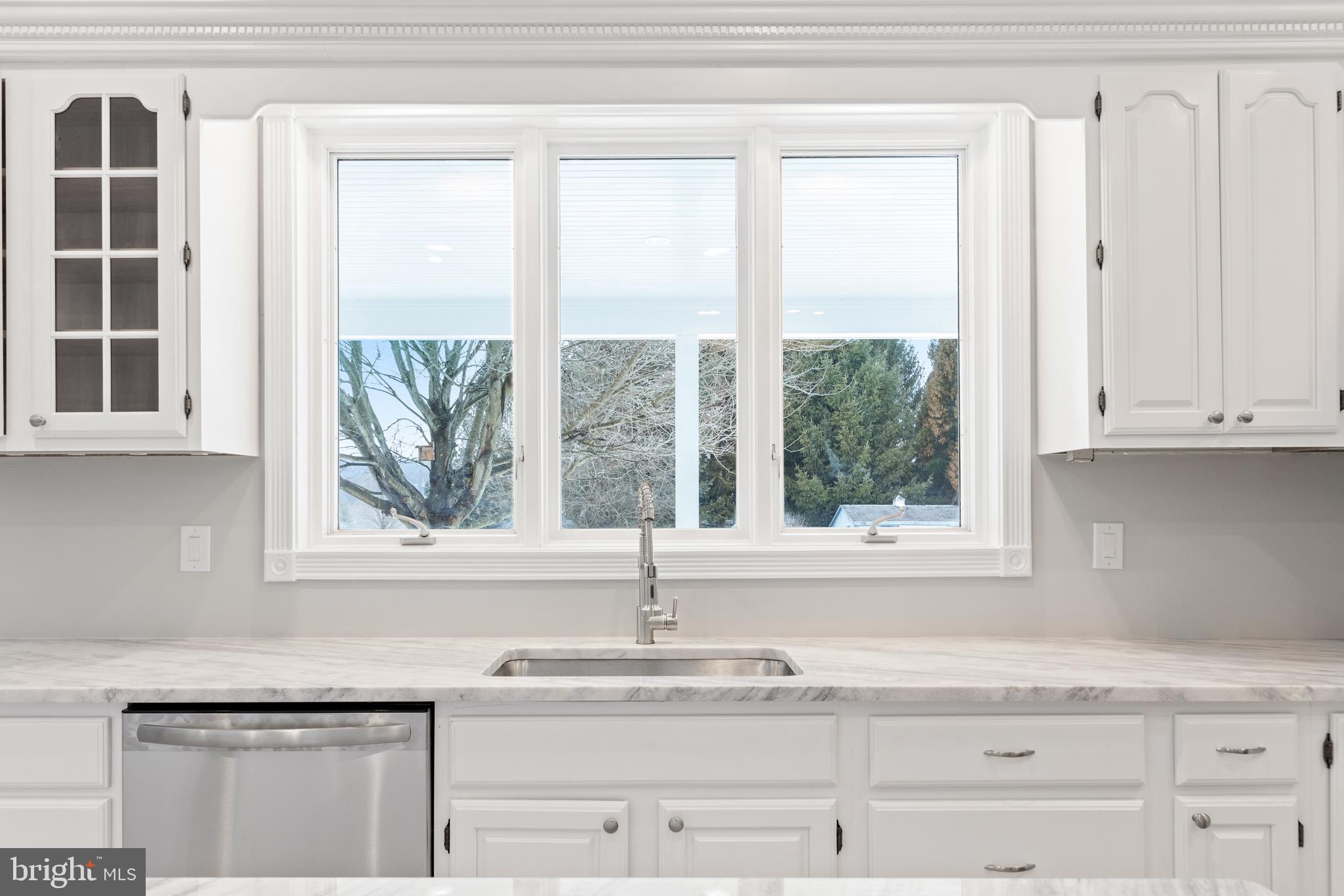 5 Saddleview Lane Doylestown, PA 18902 - Photo 22 of 63 Kitchen sink overlooks private backyard