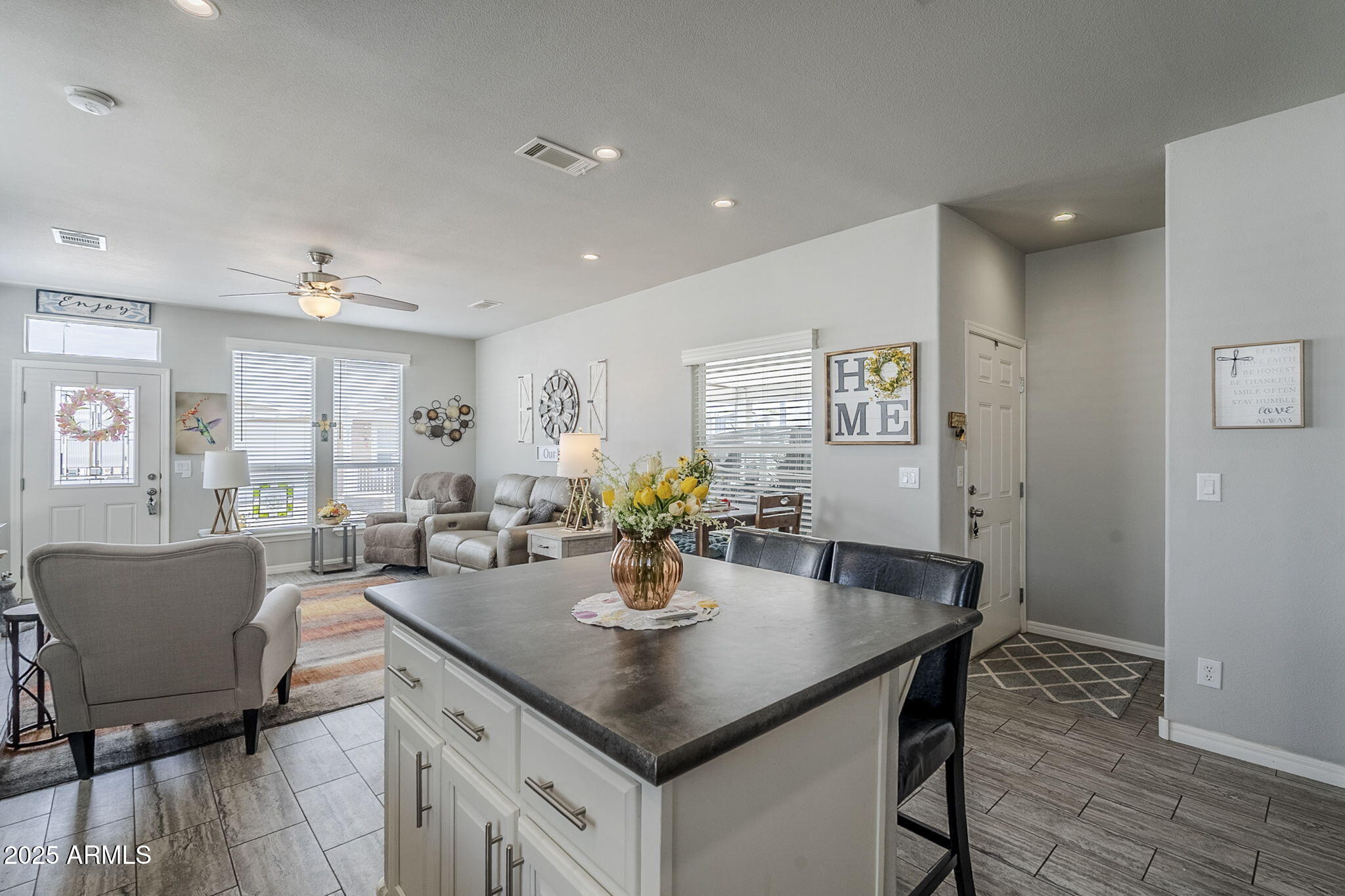650 North Hawes Road, Unit 3215 Mesa, AZ 85207 - Photo 14 of 68 a kitchen with a table and chairs in it