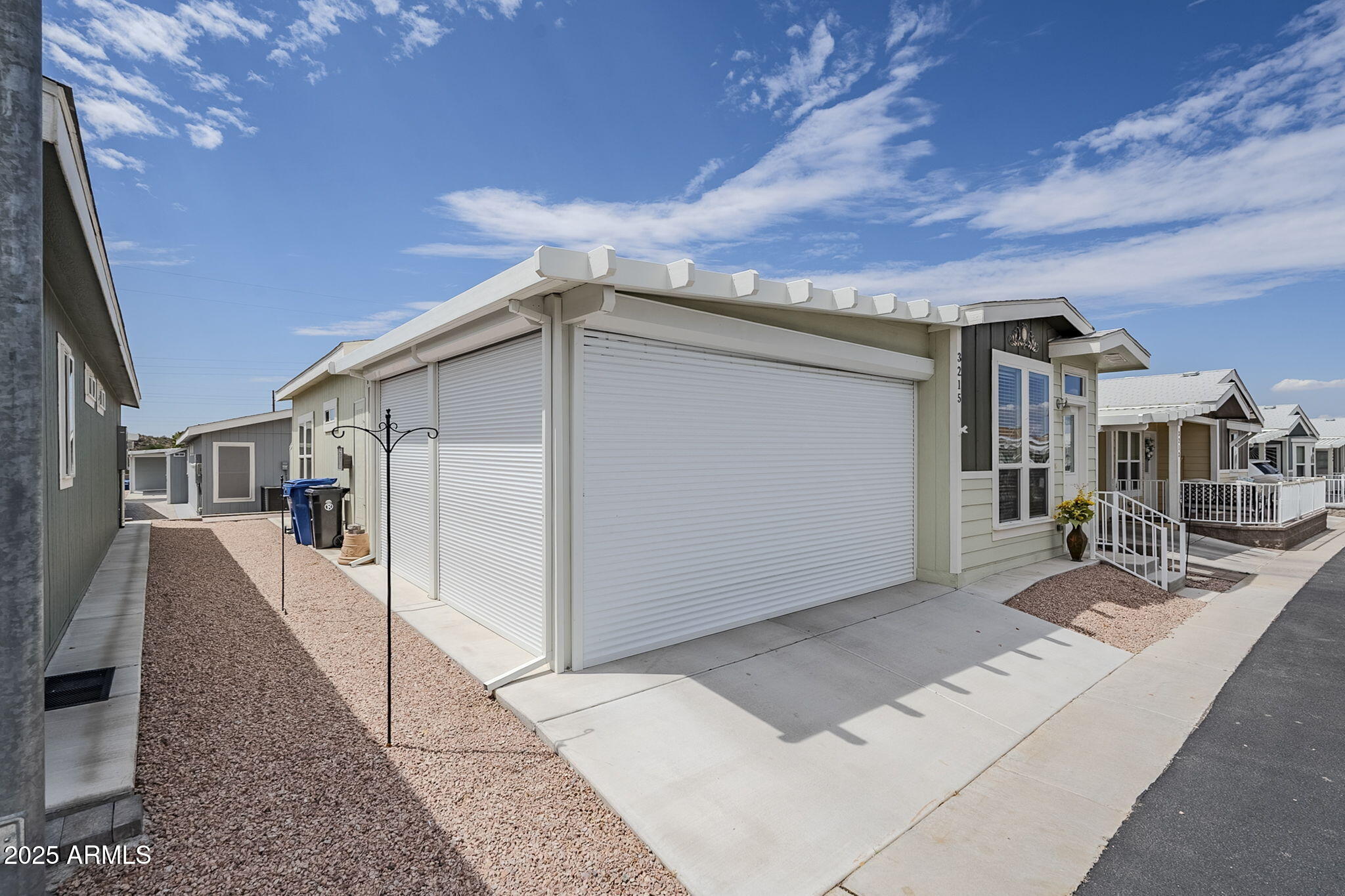 650 North Hawes Road, Unit 3215 Mesa, AZ 85207 - Photo 2 of 68 a view of a house with a backyard
