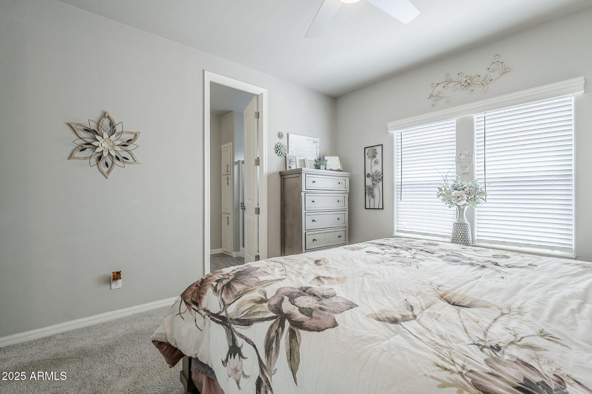 650 North Hawes Road, Unit 3215 Mesa, AZ 85207 - Photo 19 of 68 a bedroom with a bed and a window