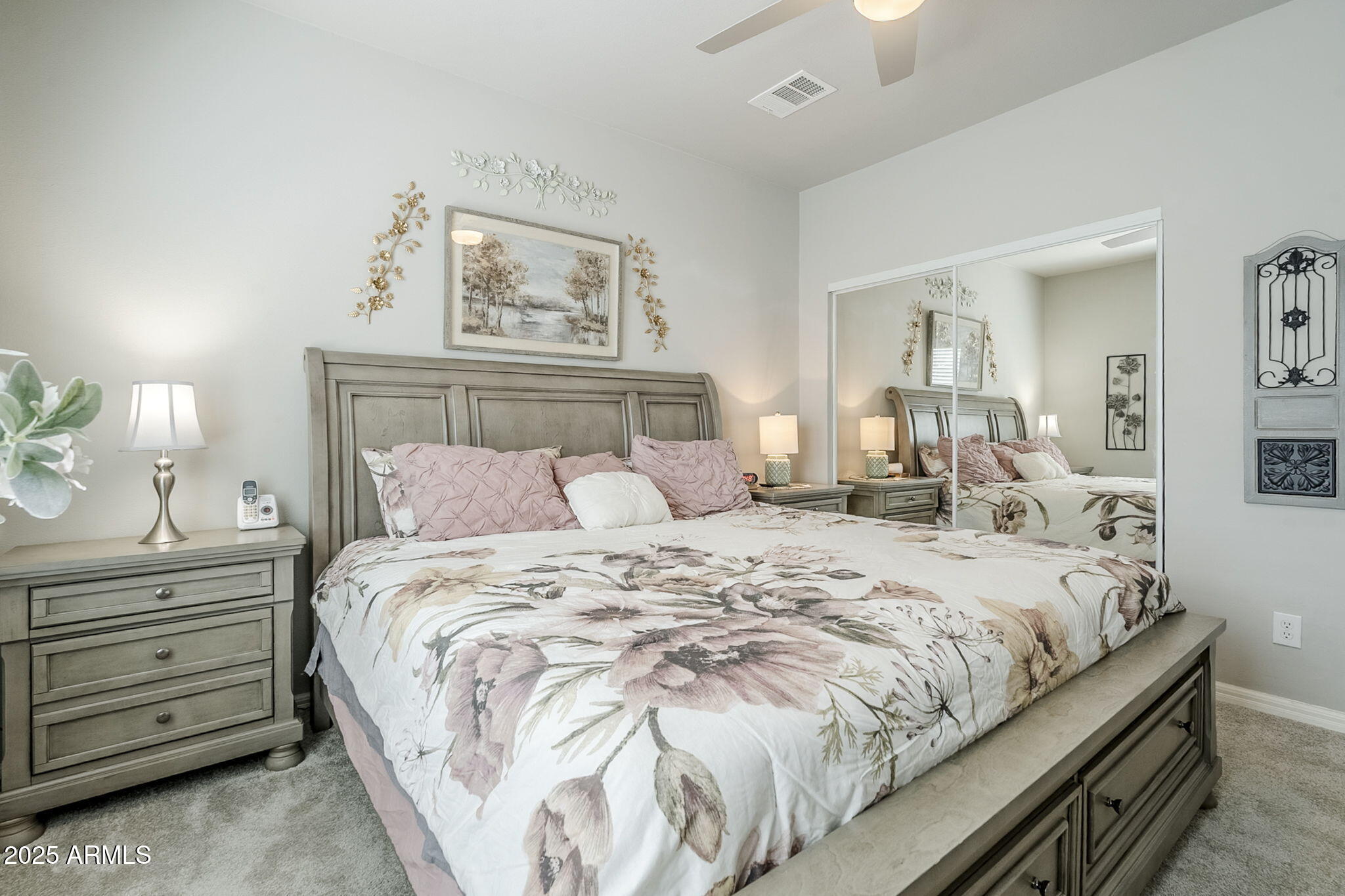 650 North Hawes Road, Unit 3215 Mesa, AZ 85207 - Photo 21 of 68 a large bed sitting in a bedroom and chair