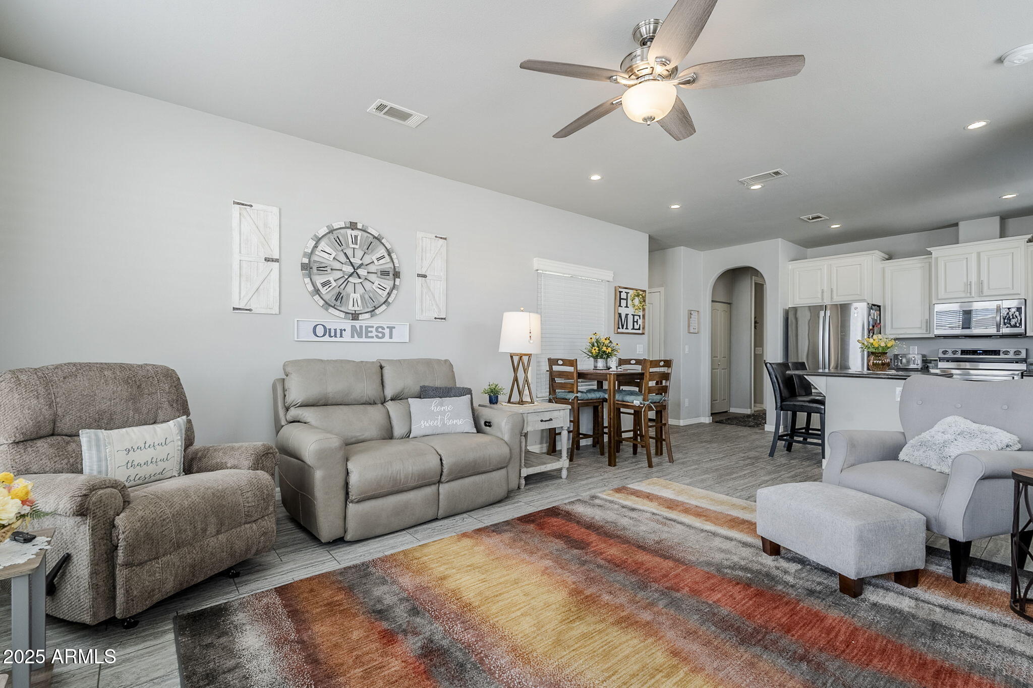 650 North Hawes Road, Unit 3215 Mesa, AZ 85207 - Photo 66 of 68 a living room with furniture and kitchen view