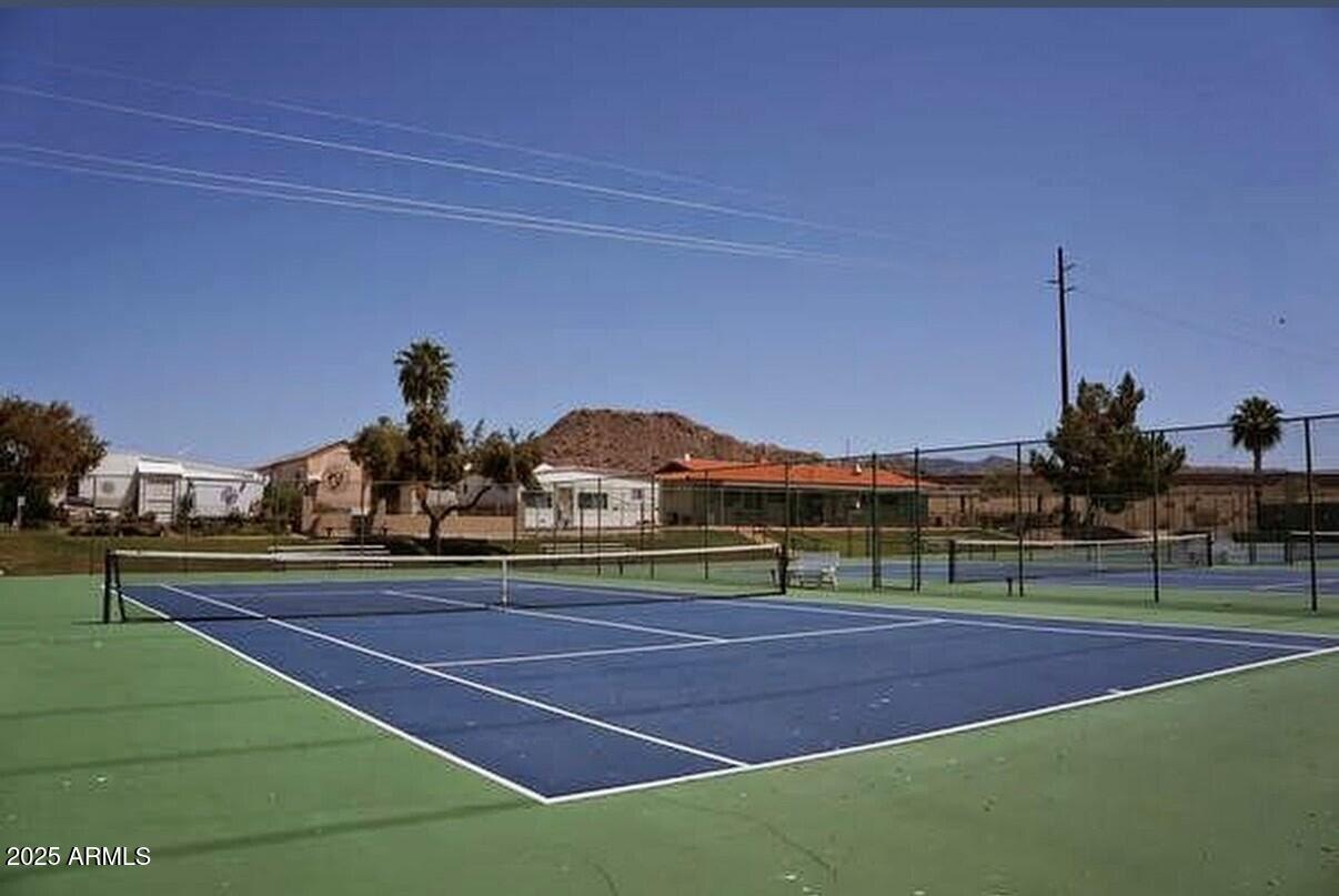 650 North Hawes Road, Unit 3215 Mesa, AZ 85207 - Photo 57 of 68 a view of a tennis court
