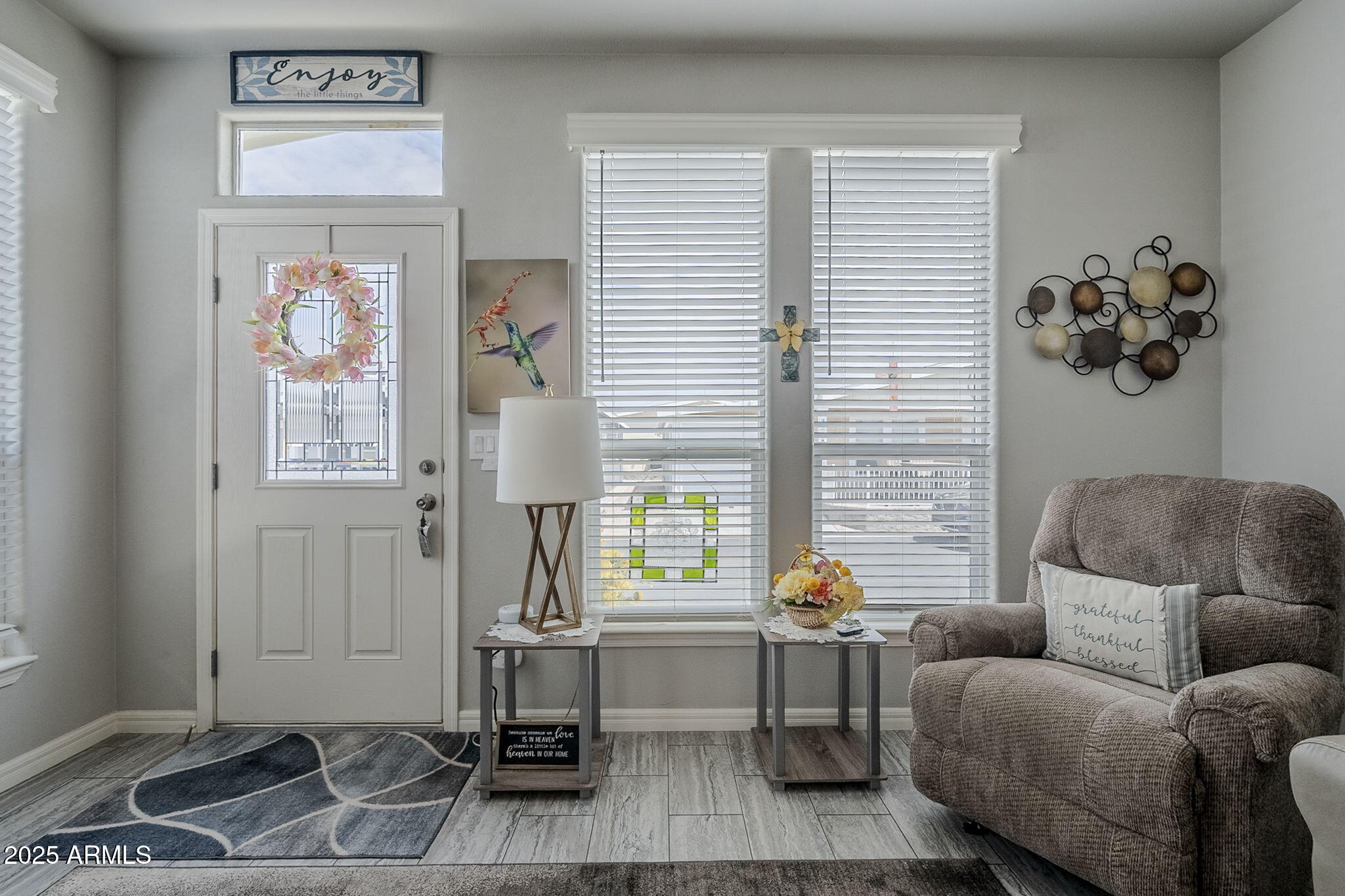 650 North Hawes Road, Unit 3215 Mesa, AZ 85207 - Photo 5 of 68 a living room with furniture and a window
