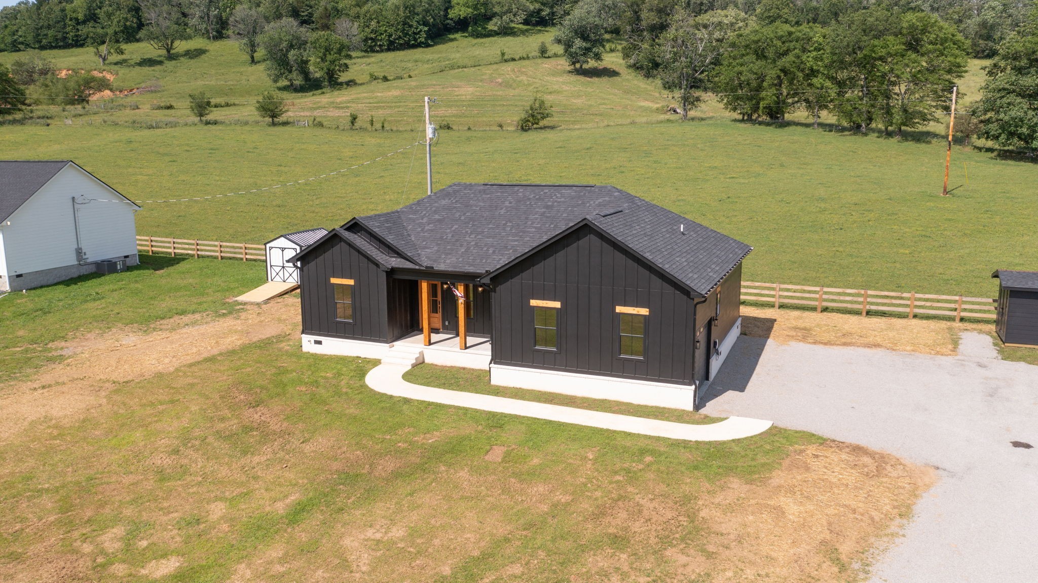 9734 Campbellsville Road Pulaski, TN 38478 - Photo 19 of 20 a front view of a house with a yard