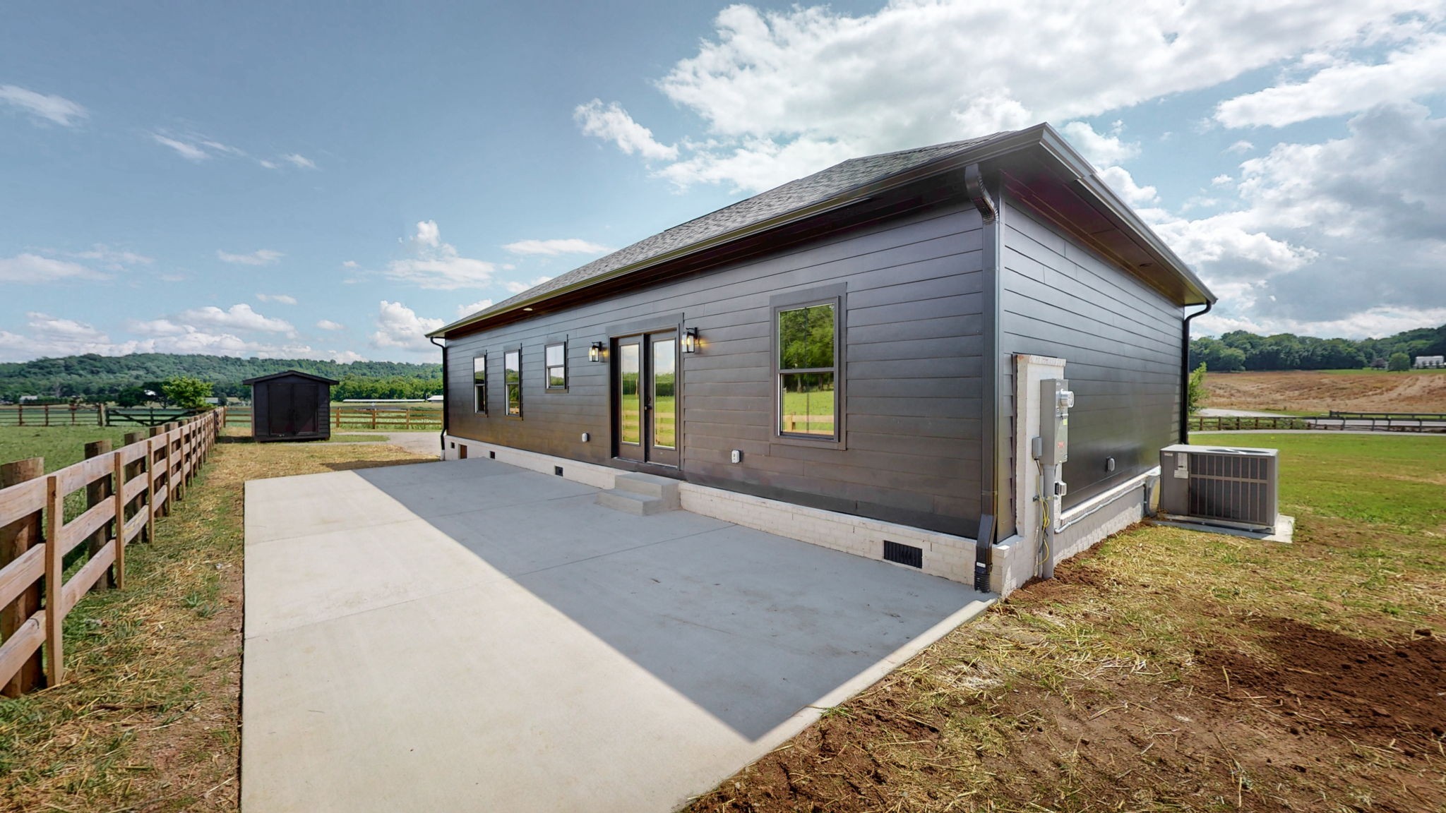 9734 Campbellsville Road Pulaski, TN 38478 - Photo 2 of 20 a view of a house with a backyard