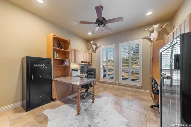 a room with furniture a desk and chair