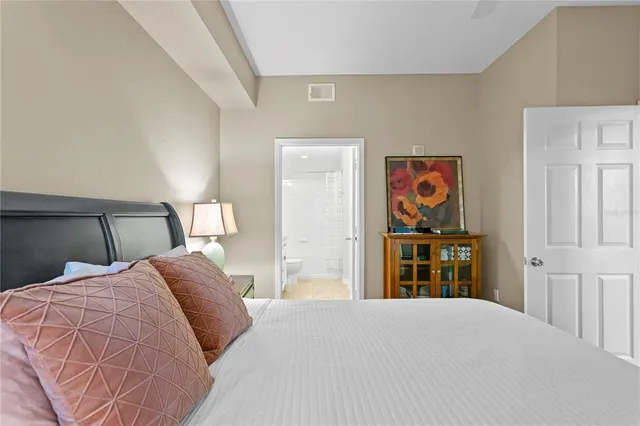 a view of a kitchen area with dining table and chairs