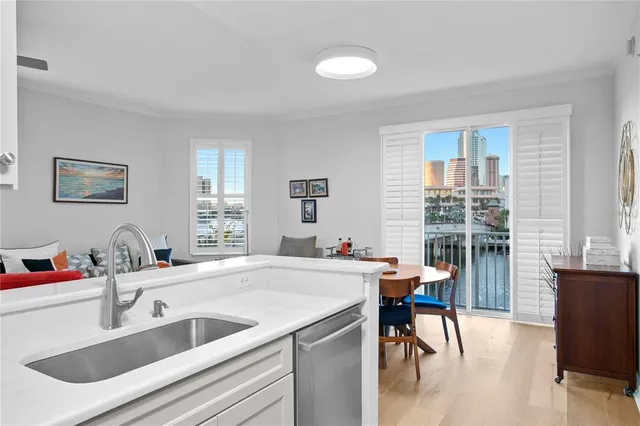 a view of a building with garden and sitting area