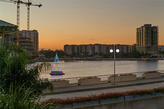 a view of a lake with a large building