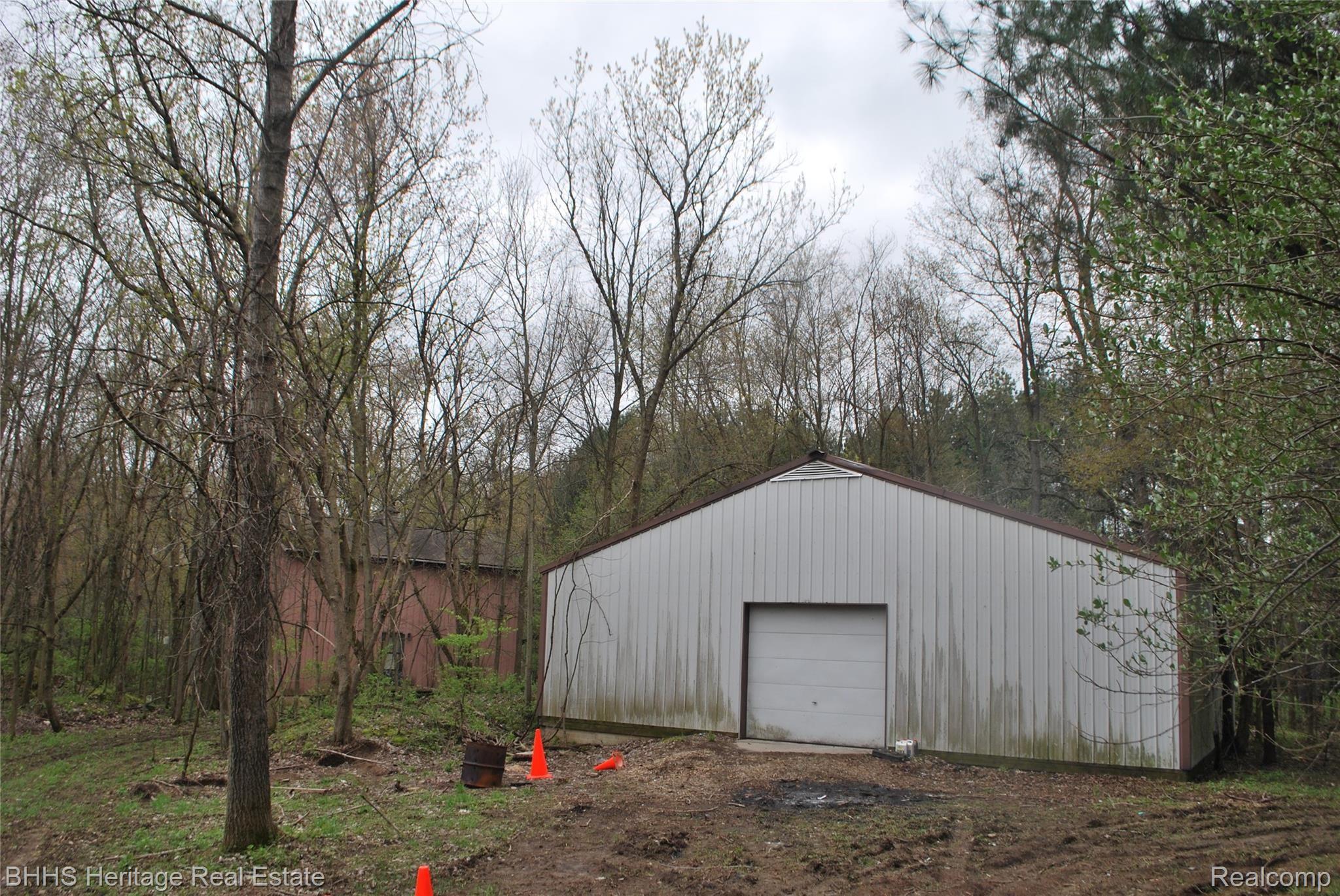 10899 West Allen Road Fowlerville, MI 48836 - Photo 12 of 31 Roll up door side of the pole building
