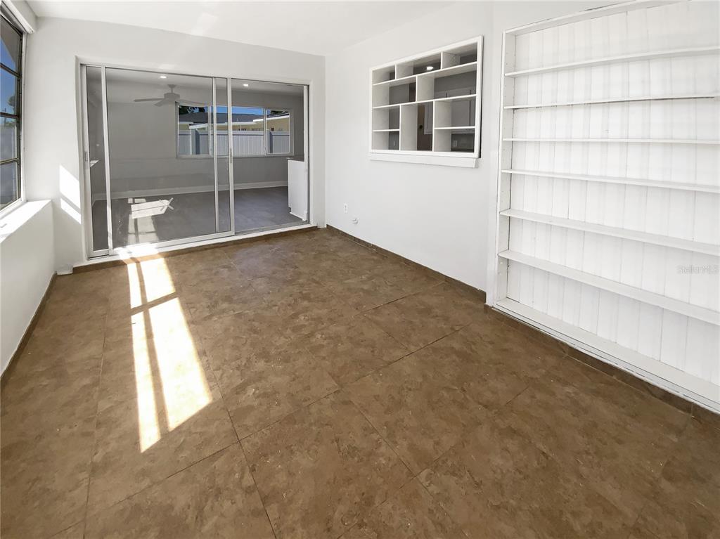 10454 138th Street Largo, FL 33774 - Photo 32 of 35 a view of an empty room with a window