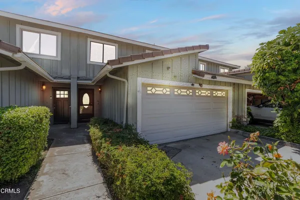 a view of a back yard of the house