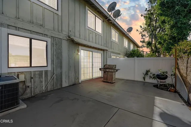 a view of a back yard of the house