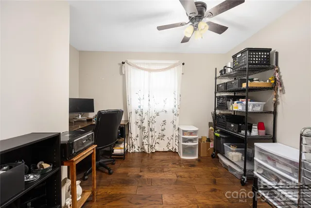 a view of a workspace with furniture