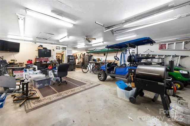 a living room with lots of furniture and a flat screen tv