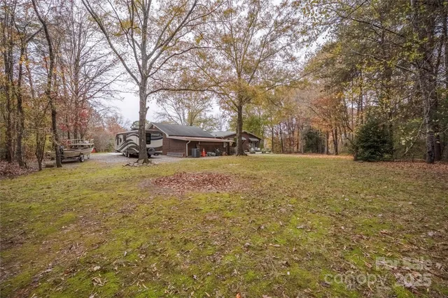 a view of swimming pool with trees