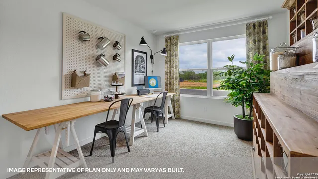 a bedroom with a bed and a cabinets