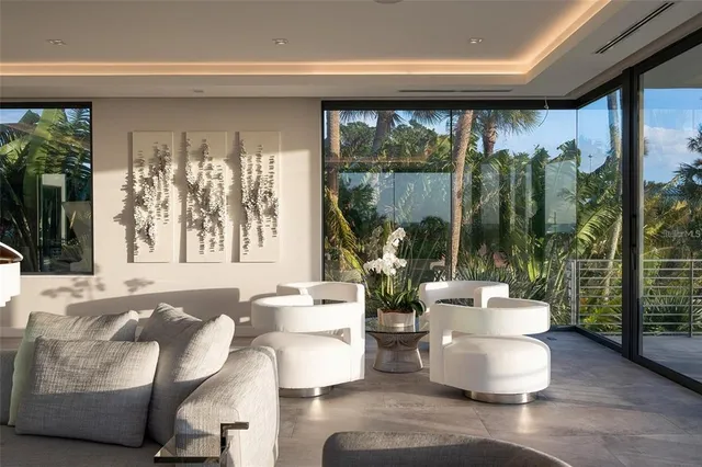 a living room with patio and a yard