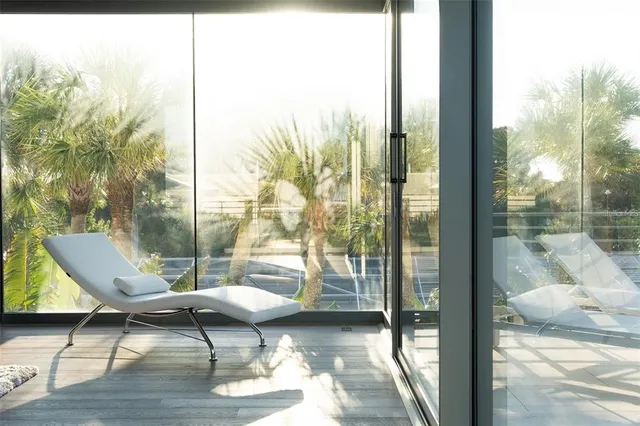a view of kitchen with stainless steel appliances refrigerator oven and cabinets