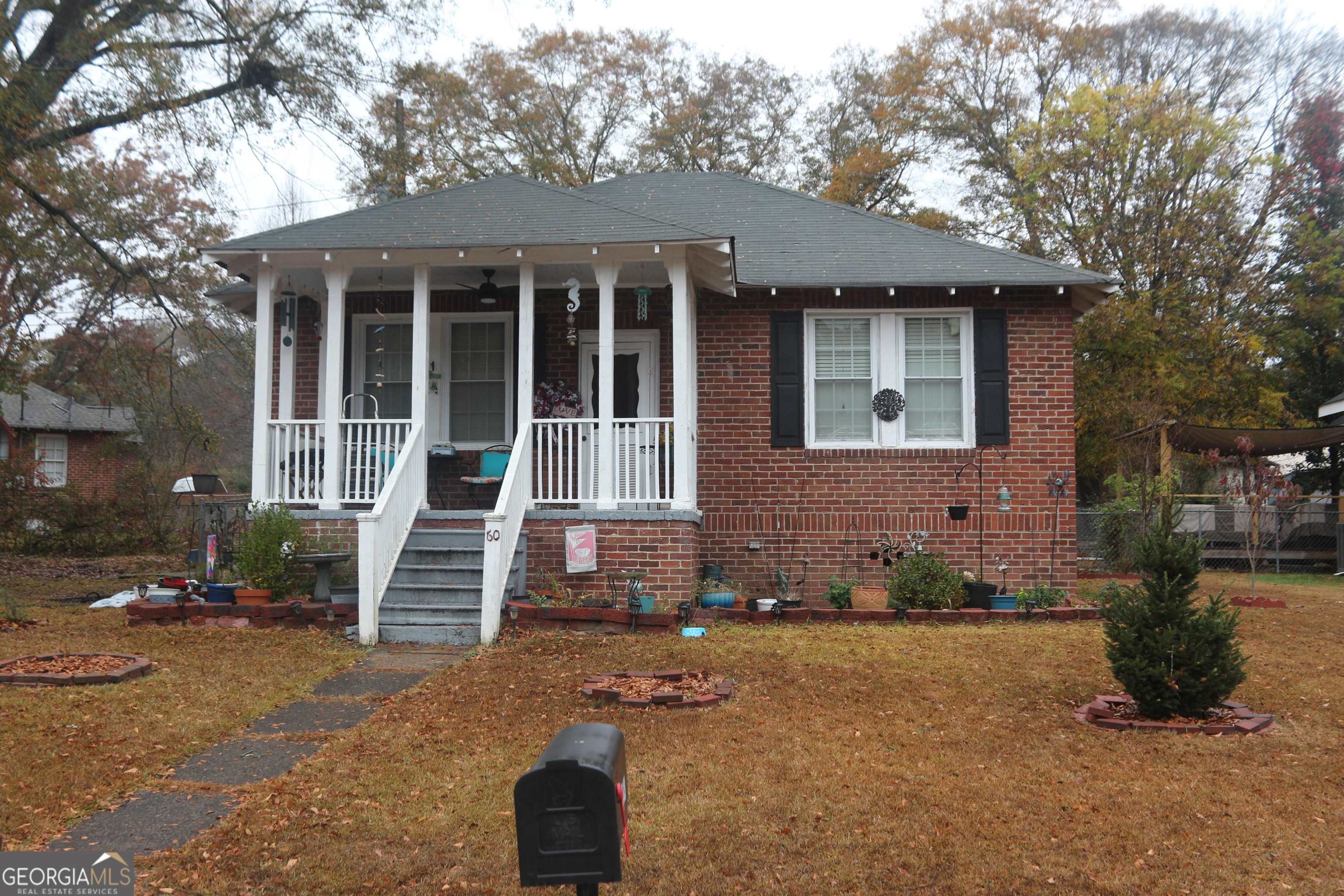 60 Ash Street Northeast Rome, GA 30161 - Photo 1 of 1 front view of a house with a yard