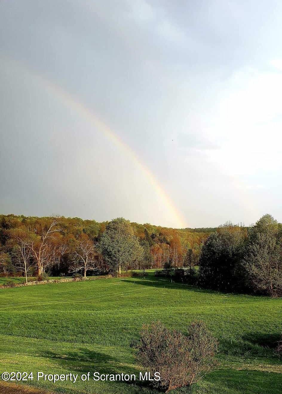 210 Krols Lane Honesdale, PA 18431 - Photo 1 of 15 a view of grassy field with mountain