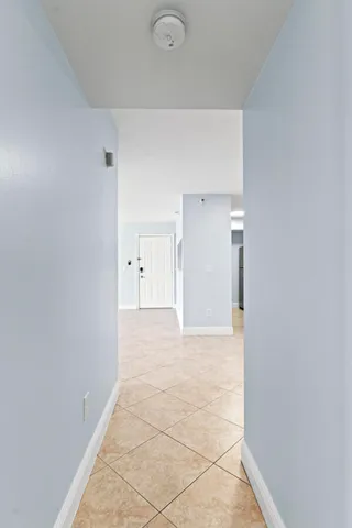 a kitchen with stainless steel appliances granite countertop a stove and a refrigerator