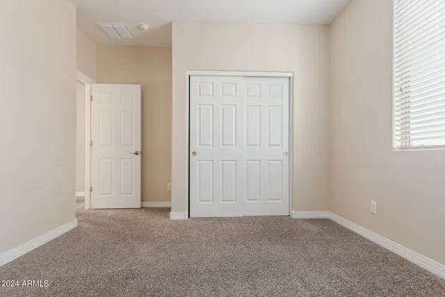 a view of a street with sign board