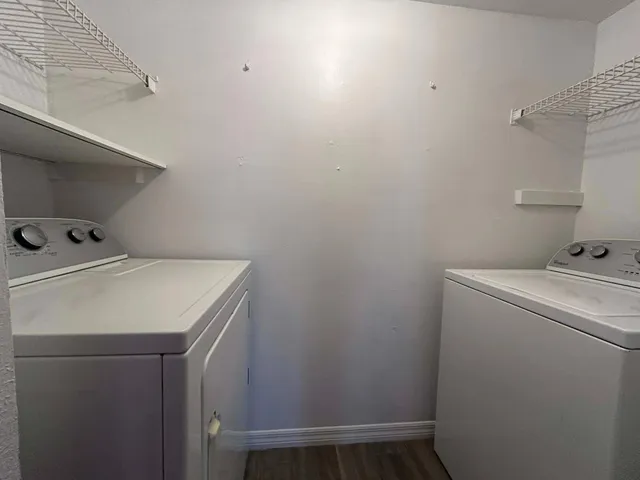 a utility room with dryer and washer