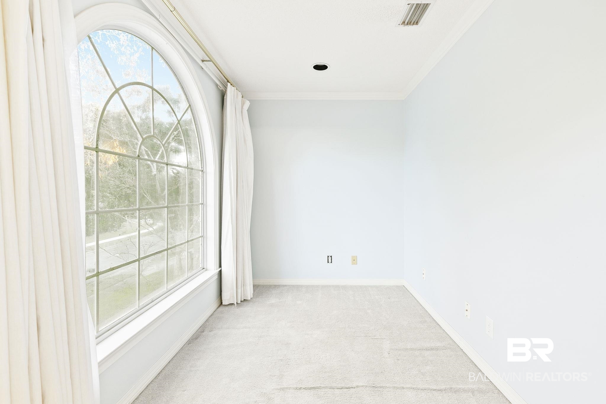 2100 Stonebrook Drive West Mobile, AL 36695 - Photo 28 of 60 Primary Bedroom with light carpet and crown molding