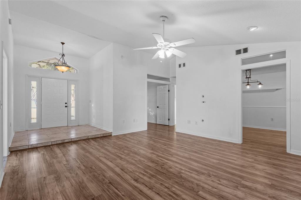 4644 Sawgrass Boulevard New Port Richey, FL 34653 - Photo 23 of 34 wooden floor in an empty room with a window