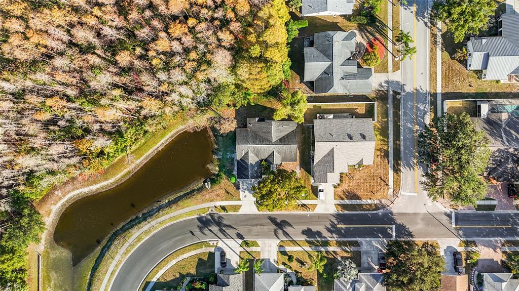 4644 Sawgrass Boulevard New Port Richey, FL 34653 - Photo 30 of 34 an aerial view of a residential apartment building with a yard