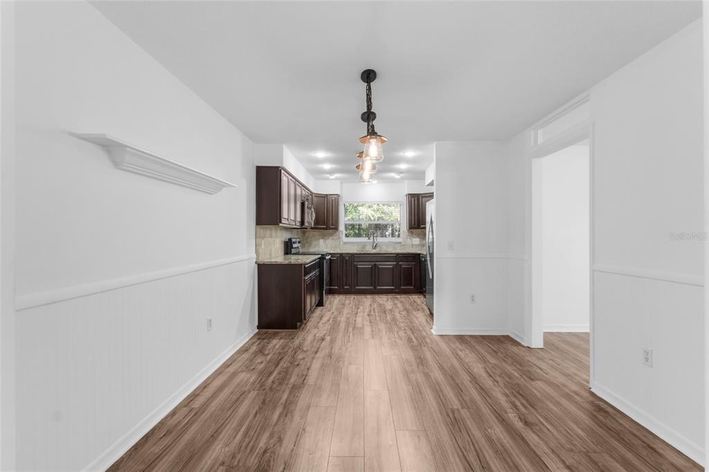 4644 Sawgrass Boulevard New Port Richey, FL 34653 - Photo 5 of 34 a large kitchen with a lot of counter space