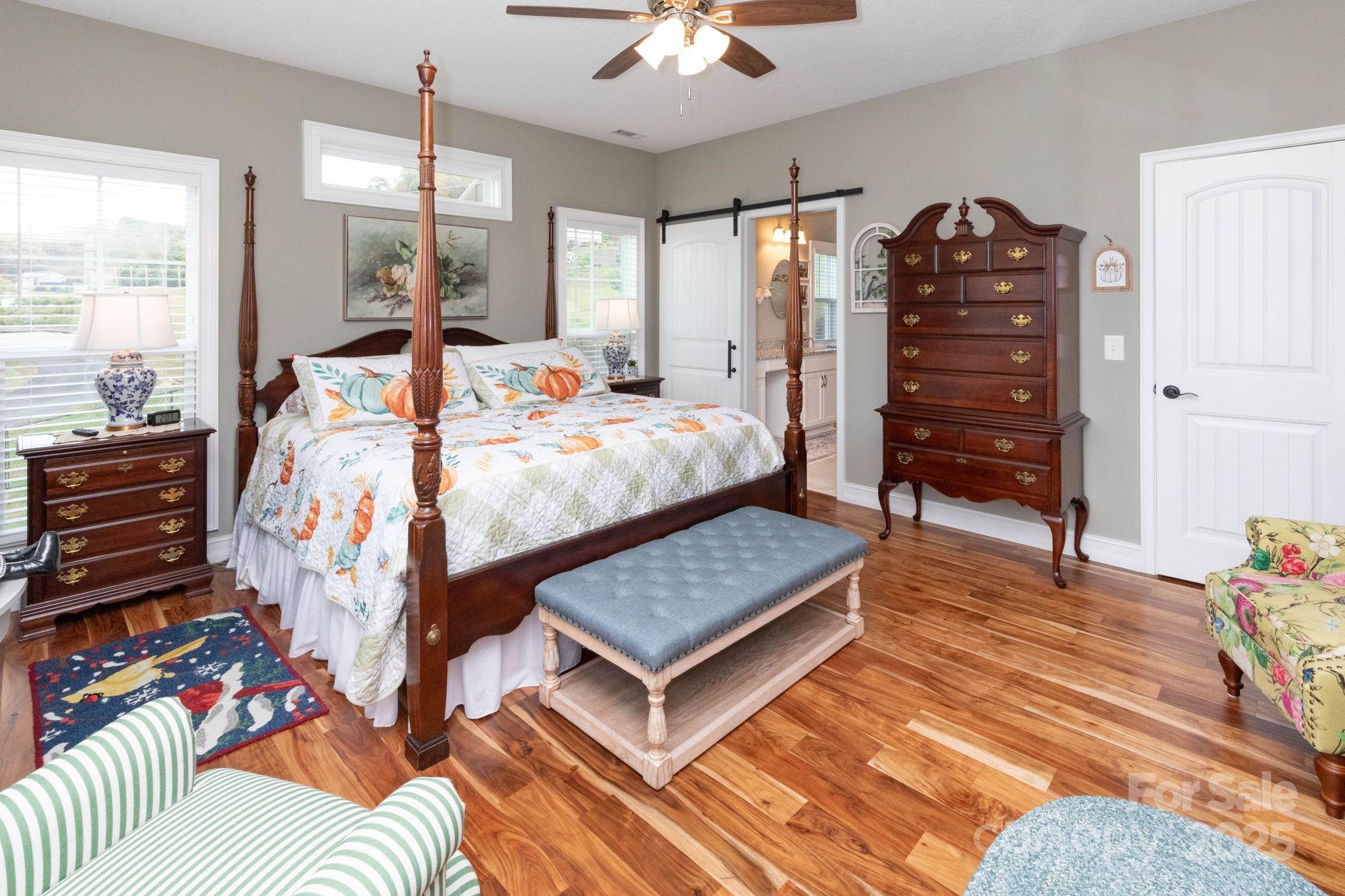 605 Red Bank Road Waynesville, NC 28786 - Photo 15 of 34 a bed room with a bed window and a dresser