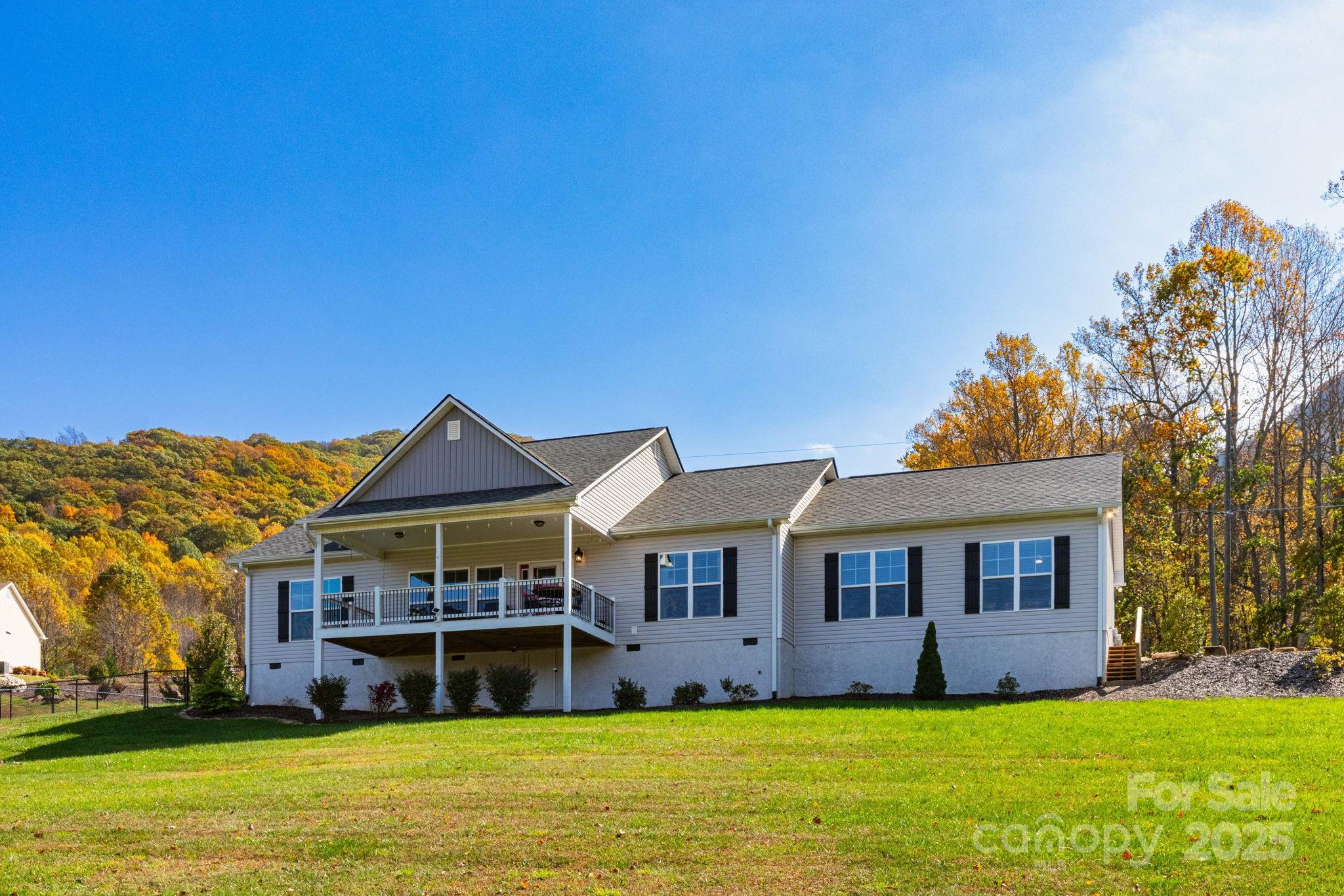 605 Red Bank Road Waynesville, NC 28786 - Photo 26 of 34 a front view of a house with a yard