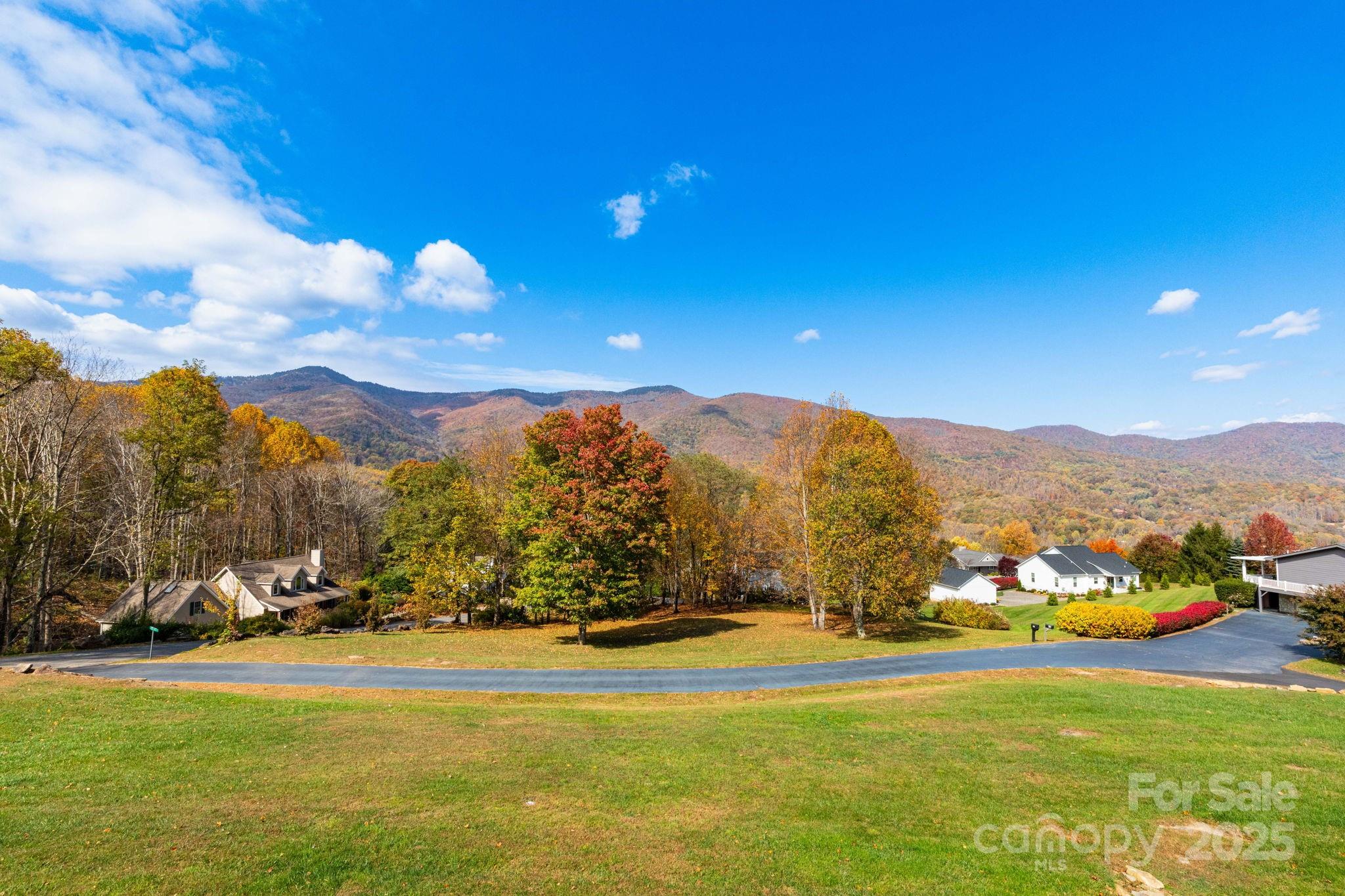 605 Red Bank Road Waynesville, NC 28786 - Photo 30 of 34 a view of a town with mountains in the background