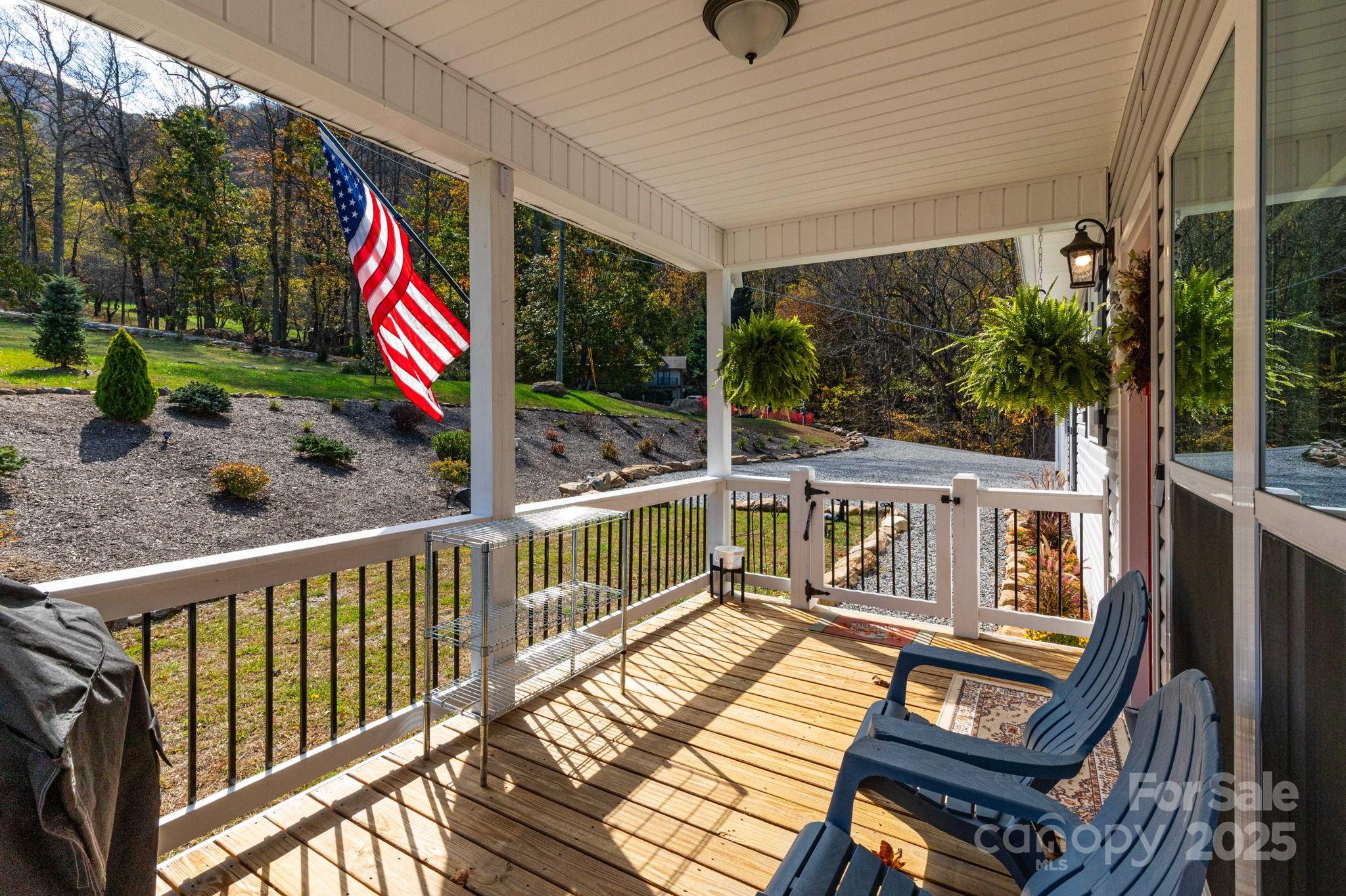 605 Red Bank Road Waynesville, NC 28786 - Photo 5 of 34 a view of a balcony with chairs