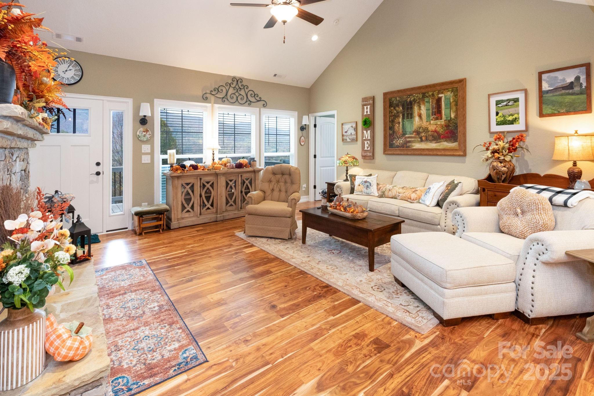 605 Red Bank Road Waynesville, NC 28786 - Photo 9 of 34 a living room with furniture and a lamp