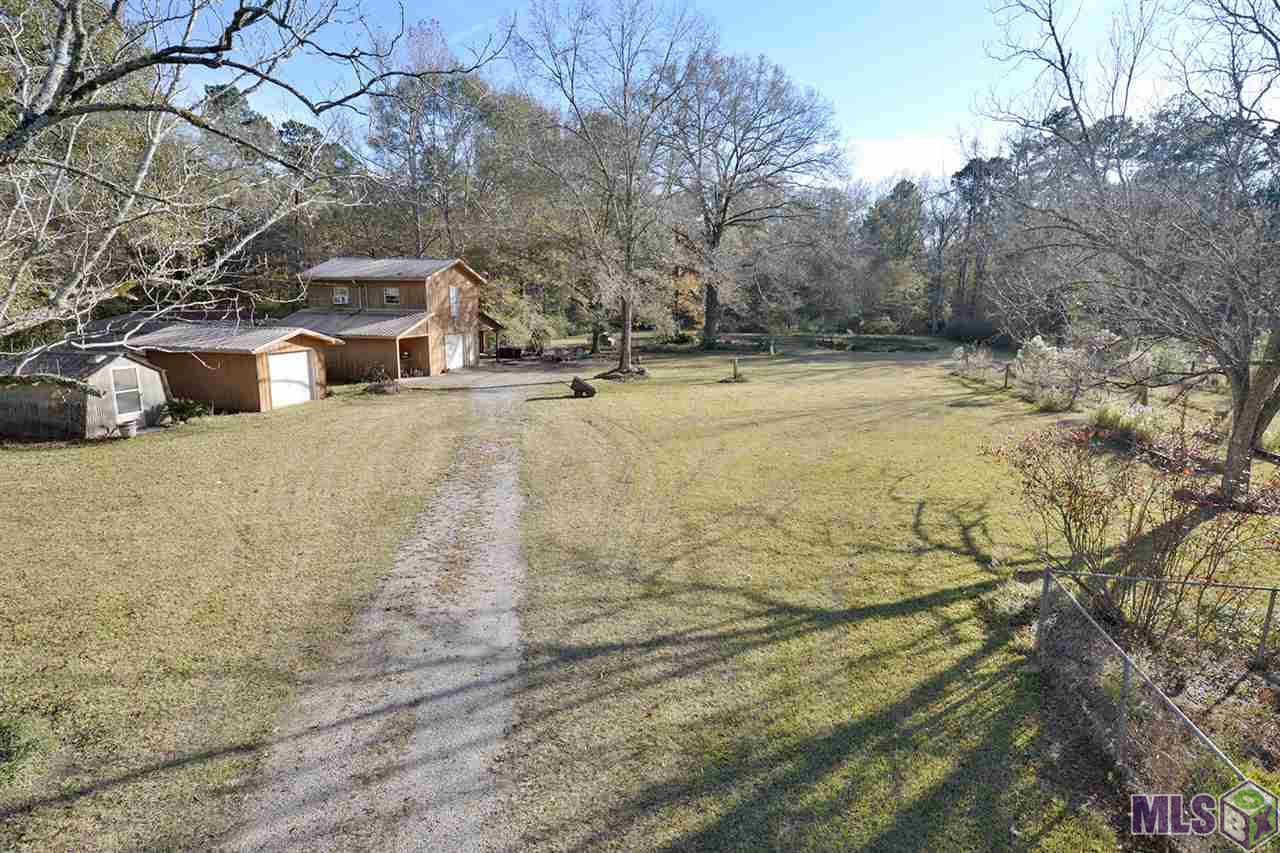 9808 Arnold Road Denham Springs, LA 70726 - Photo 2 of 16 Green House ~ Storage Shed ~ Workshop ~ Guest Apartment