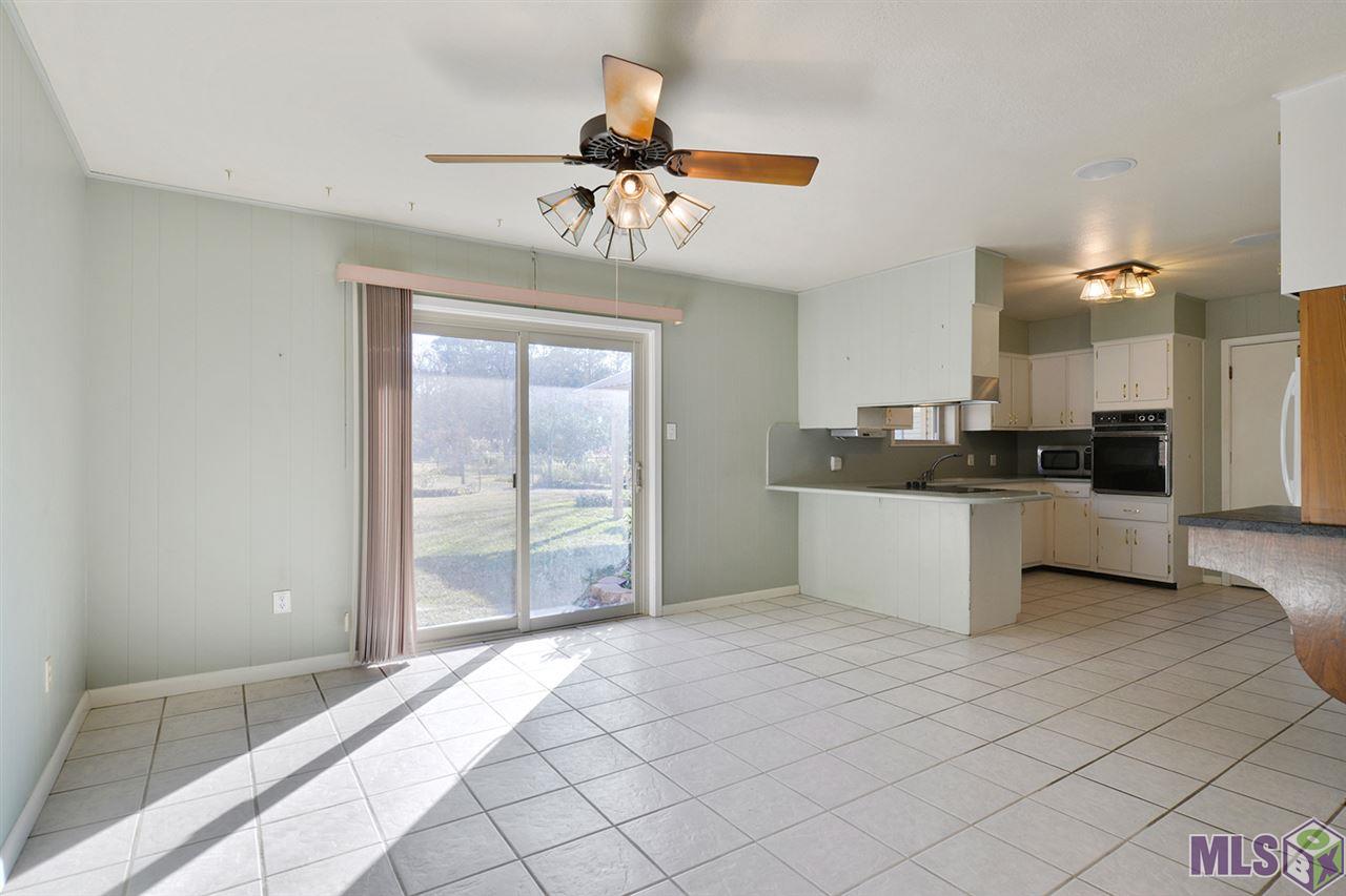 9808 Arnold Road Denham Springs, LA 70726 - Photo 10 of 16 Dining Room is Open to the Kitchen
