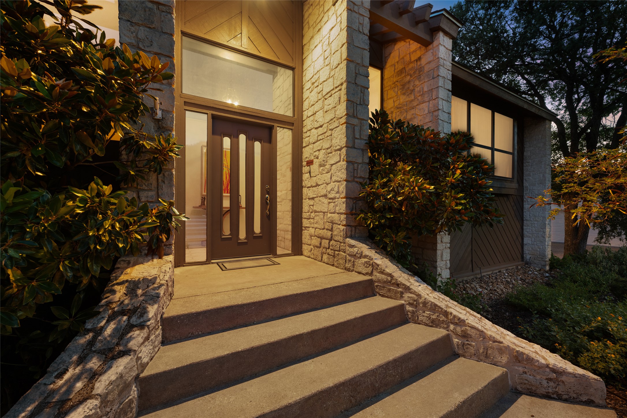 5319 Musket Ridge Austin, TX 78759 - Photo 2 of 39 Stone facade and broad concrete steps welcome you to this inviting home entrance.